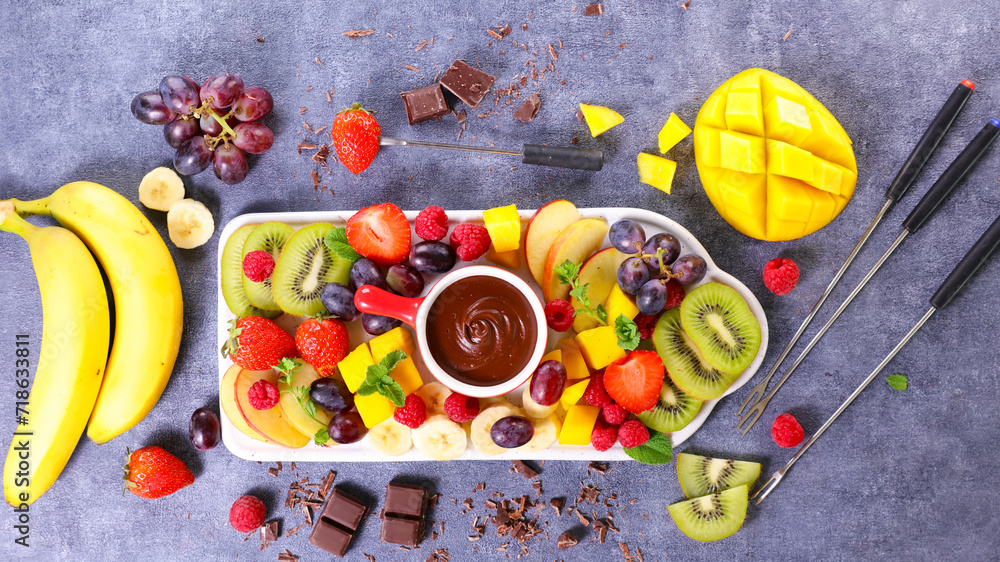 Sticker chocolate fondue pot with various fresh fruits