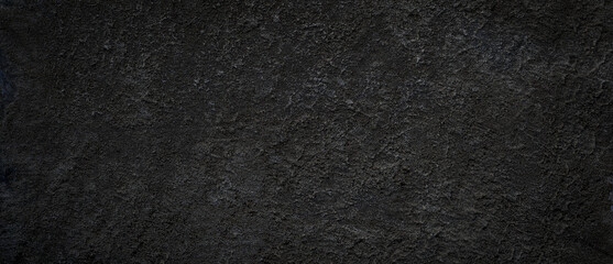 Textured Black Wall or Asphalt Surface Captured Under Even Lighting Conditions