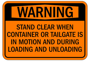 Truck warning sign and labels stand clear when container or tailgate is in motion and during loading and unloading
