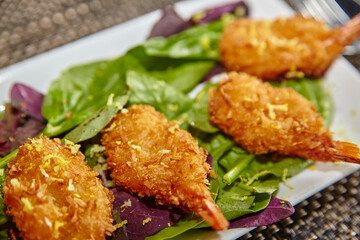Gourmet Crispy Shrimp Salad on Vibrant Greens Close-Up