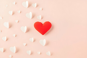 Red heart and white paper hearts on pastel pink background. Valentines day concept.
