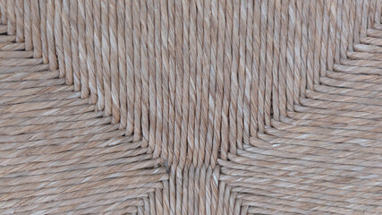 Background texture of brown straws chair weave pattern