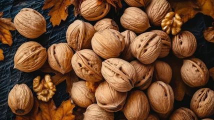 Fotobehang Background with walnuts nuts. Top view of nuts © Vladimir