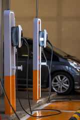 EV charging and electric car, Electric car charging station for charge EV battery, Plug for vehicle...