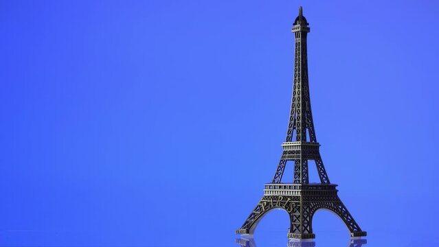 Eiffel Tower against colorful backgrounds.  Paris 2024 Summer Olympics. 