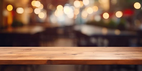 Foto op Canvas Blurry restaurant interior background with empty wooden table top - perfect for product display or montage. © Sona