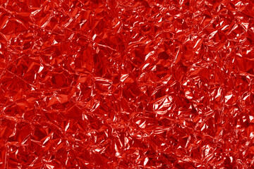 Red foil leaf shiny texture, abstract wrapping paper for background and design art work. - obrazy, fototapety, plakaty