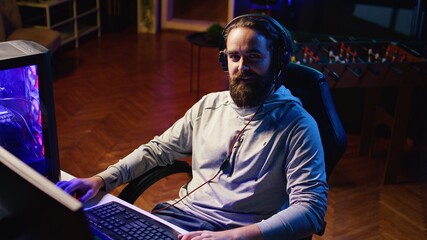 Gamer discussing with audience multiplayer video game match winning strategies during livestream....