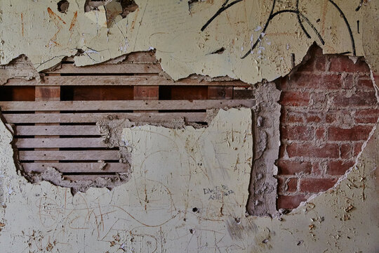 Decaying Wall with Graffiti and Exposed Brickwork, Abandoned Ohio Building