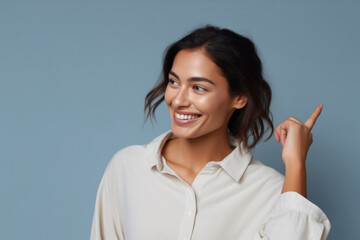 Fototapeta premium Young smiling active woman with a hand gesture