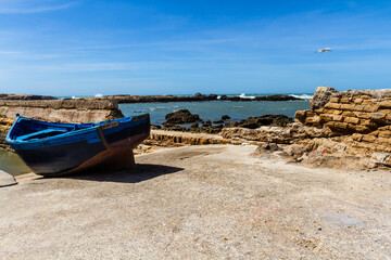Fototapeta na wymiar Wooden fishing boat on the waterfront of the old port. Essaouira, Morocco, Africa