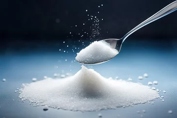 Fotobehang One spoonful of white sugar in the photo on a dark blue Background. generative AI © original logo