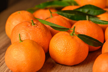fresh juicy tangerines on a wooden table 3