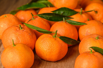 fresh juicy tangerines on a wooden table 24
