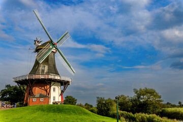 Twin windmills in Greetsiel, East Frisia, Germany.