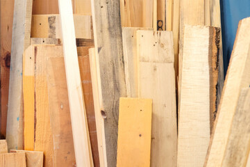 Scraps of wooden boards. wood recycling. Industrial background.