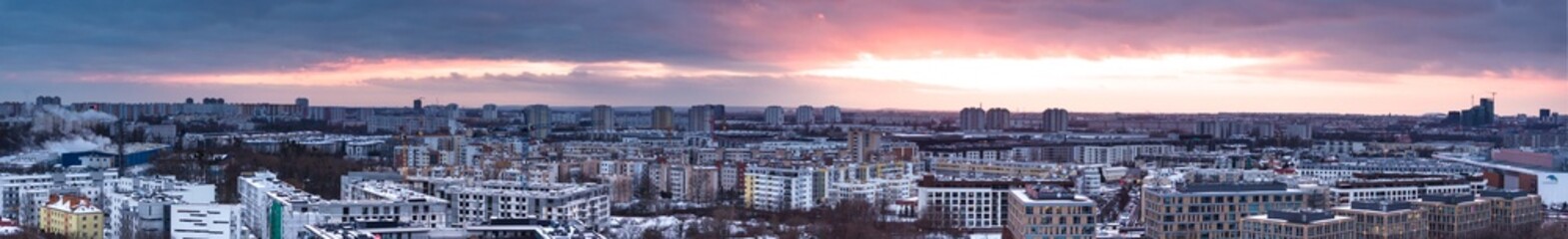 Aerial panorama of Poznan. Winter's Embrace: Sunset over Lake Malta, Poznań. A panoramic view of...