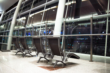 Empty passenger waiting seat in airport departure gate