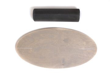 Wooden balance board on white background