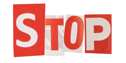 The word stop made from cut out letters