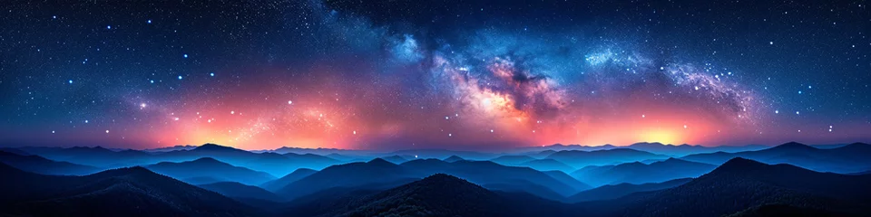Panoramic view of the Milky Way galaxy over mountainous landscape. Astrophotography and night sky observation concept  © Alexey