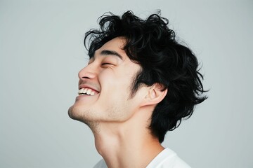 Fototapeta premium 日本人の若い男性の横顔（若者・モデル・アジア人・白背景・背景なし） 