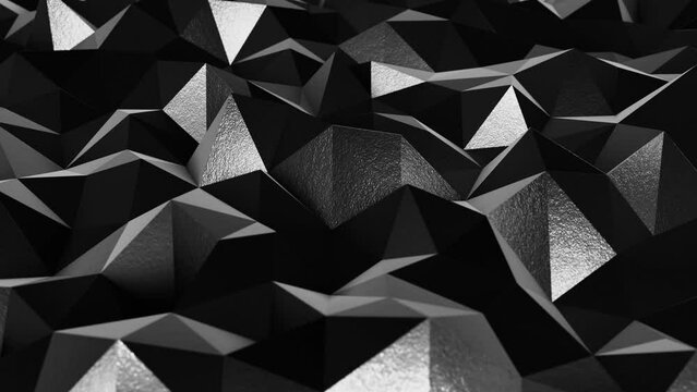 Realistic abstract looping 3D animation of the moving textured black polygonal surface rendered in UHD as motion background