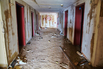 Abandoned Hotel Corridor with Graffiti and Debris, Urbex Mood