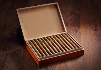 Cuban cigars on a wooden floor