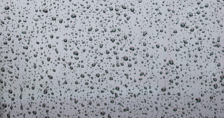 Rain drops pattern on window background.