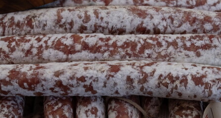 Homemade salami on sale at the Italian food market