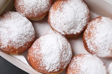 Delicious sweet buns in box, top view