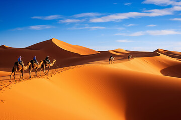 Fototapeta na wymiar Camel caravan in desert sand dunes