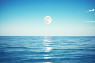 Naklejka na ściany i meble blue moon shining over calm ocean waters