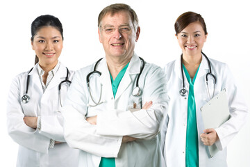 Fototapeta premium Medical team lead by senior male doctor.