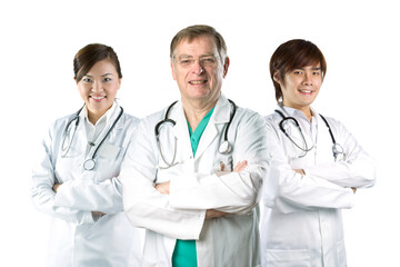 Fototapeta premium Medical team lead by senior male doctor.