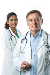 Fototapeta premium Medical team lead by senior male doctor.