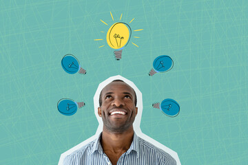 Happy young businessman with an idea looking up, drawn light bulb. New idea. Strategy, business...