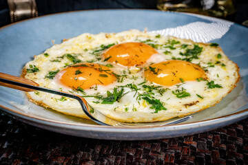 Fried eggs with a slice of bread