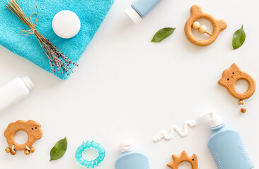 Frame of baby bath cosmetic products flat lay with toys