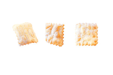 Traditional sweet crisp pastry deep-fried and sprinkled with powdered sugar isolated on white. Carnival food tradition.