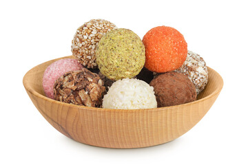 A variety of different truffles in a wooden bowl Isolated on a white background