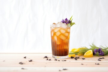 blackberry iced tea, blackberries on top, ice cubes, simple backdrop