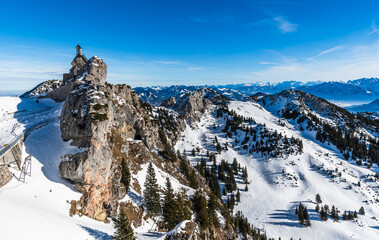 View of the church on Wendelstein mountain on a sunny winter day which is the highest church in Germany, copy space