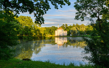 Evening view of the Turkish bath in Catherine Park with reflection in the water.