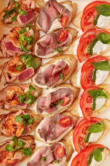 Assorted Gourmet Bruschetta Platter Close-Up - 718866817
