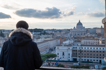 A person observing the cityscape of Rome
