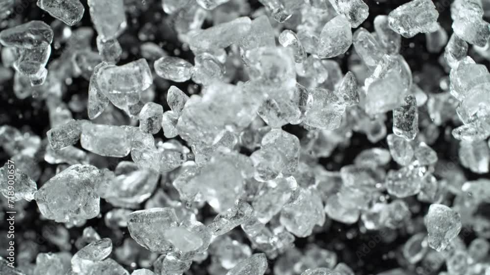 Poster super slow motion of rotating ice cubes, top view shot. filmed on high speed cinema camera, 1000 fps