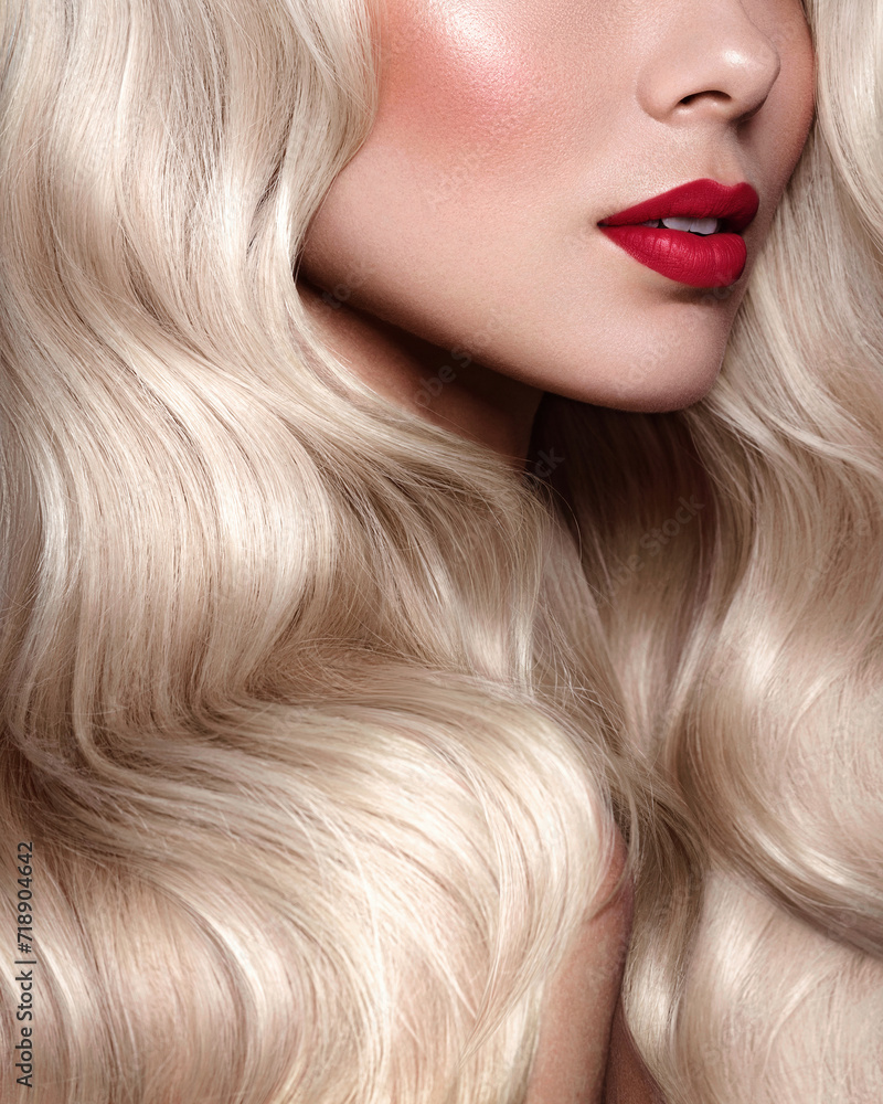 Wall mural Blonde platinum hair. Dye for coloring. Close up portrait of fas