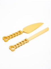 Tasty heart shaped pizza and spatula on blue background